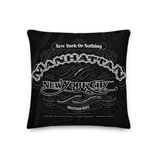 Manhattan Cartouche Throw Pillow featuring monochrome stamp-style cartouche artwork with borough landmarks and map details.