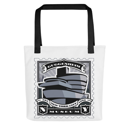 White canvas tote with Fifth Avenue clock vintage stamp illustration, black handles, ornate clock face and street detail.